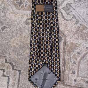 Robert Talbott Best Of Class Silk Tie Gold and Navy Geometric Medallion Pattern